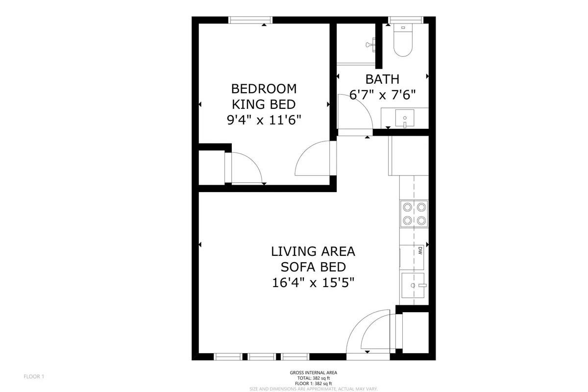 This image provides a comprehensive view of the bedroom featuring a king bed, the living area with a queen sleeper sofa, and a glimpse of the private bathroom. The furnishings appear modern and fresh, with inviting touches that evoke relaxation and togetherness.